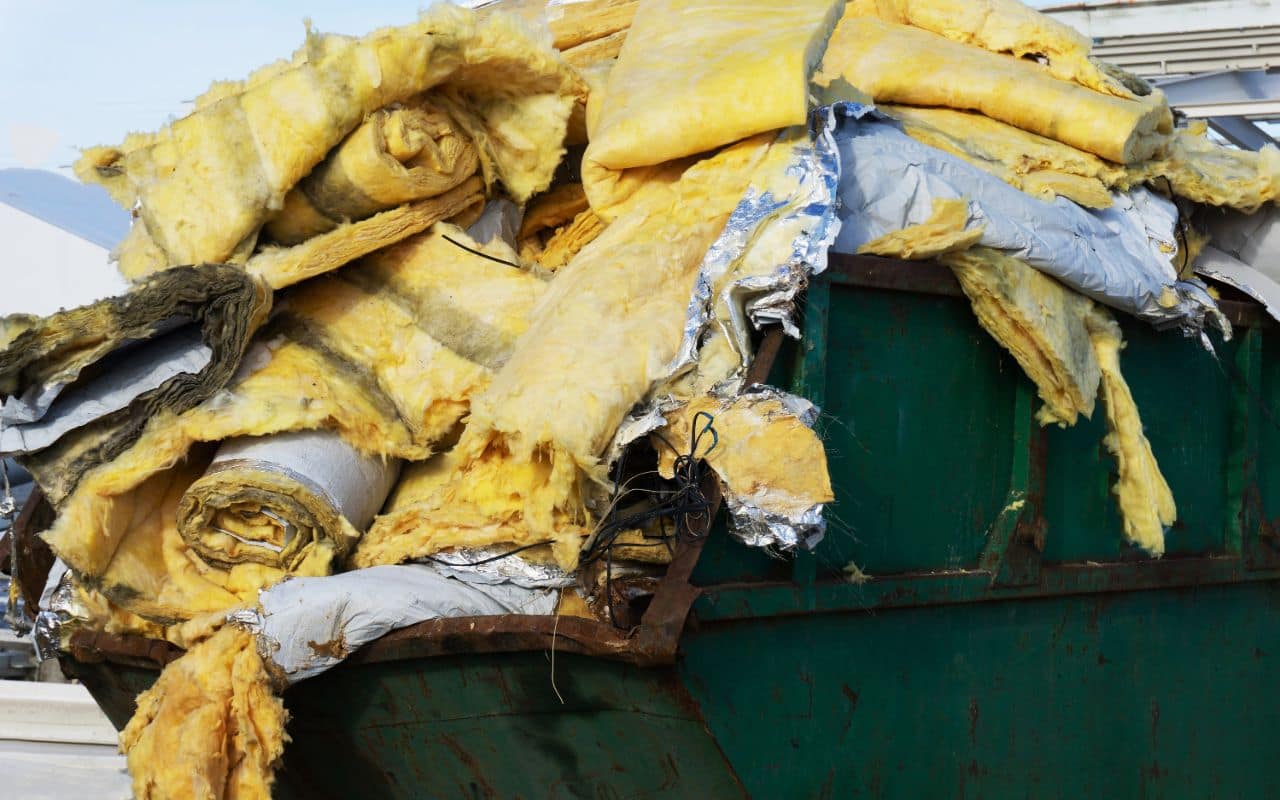 child-standing-near-garbage